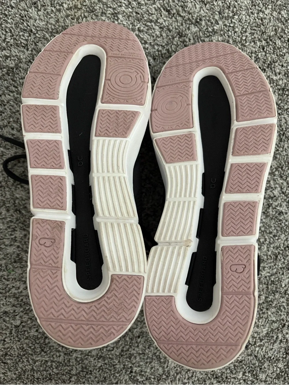 On Running Roger Women’s Black Sneakers with Pink Accents and White Sole